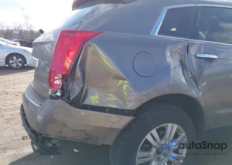 2012 Cadillac Srx Luxury Collection z USA, uszkodzony, nr VIN 3GYFNDE37CS531953